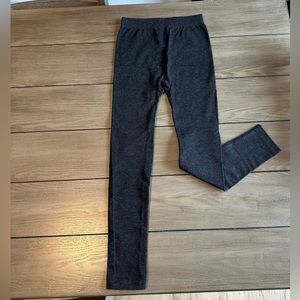 Never been worn black leggings with slight shimmer throughout.